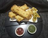 A picture of step 12 of Papad Rolls.