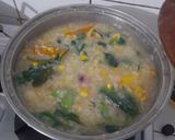 Foto langkah ke 6 dari resep Tinutuan (Bubur Manado) dan Sambal Ikan Roa.