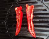 A picture of step 8 of Salmon,aubergine and spinach skewers with red pepper dressing.