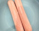 Foto del paso 1 de la receta Barquitas de salchichas y huevo 🌭🥚