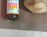 A picture of step 1 of Peach ice tea and coconut water cocktail.