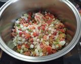 Foto del paso 13 de la receta: Alubias con calamar, gambas, langostinos y choco