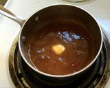 A picture of step 6 of Beer Can Chicken in an oven!.