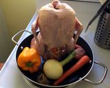 A picture of step 3 of Beer Can Chicken in an oven!.
