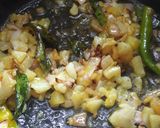 A picture of step 2 of Kaanda Batata Poha (onion/potato poha).