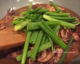 A picture of step 6 of Stir-Fried Baby Squid with Thai Basil.