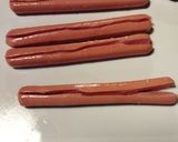 Une image de l'étape 1 de Knacki grillée jambon-fromage.