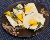A picture of step 5 of Basil Fried Eggs.
