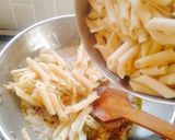 A picture of step 6 of Cheesey Creamy White sauce pasta.