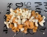 A picture of step 6 of Sunny Melon Salad with Feta, Lomo, and Sichuan Pepper.