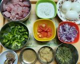 A picture of step 1 of Coconut Chicken Bharta.