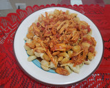 Foto del paso 5 de la receta: Pollo desmenuzado en salsa de tomate..