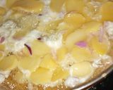 A picture of step 2 of Potato with egg n akra.