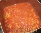 A picture of step 3 of Prawn, tomato and feta orzo.