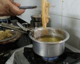 A picture of step 2 of Rajasthani ghevar with white chocolate ganache.