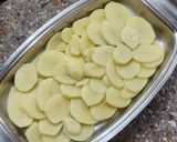 Foto del paso 3 de la receta: 🍗🥔🧅 Alitas de pollo al horno sobre colchón de papas y cebollas 🧅🥔🍗