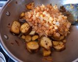 A picture of step 3 of Raw Banana and white peas curry.