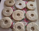 A picture of step 7 of Coconuts doughnuts.
