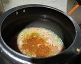 A picture of step 2 of Oats moong dal khichdi.