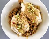 A picture of step 4 of Banana ice cream with granola and peanut butter sauce.