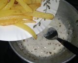 A picture of step 9 of Chinese Loaded fries.