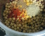 A picture of step 5 of Chole Pulao.
