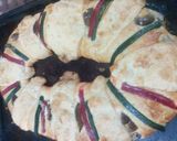 A picture of step 6 of Rosca de Reyes Filled with Cream and Fruit.