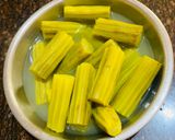 A picture of step 1 of Muniga badi jhola (Drumsticks & sun dried lentil dumplings).