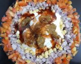A picture of step 4 of Cheese Dahi Bhalla Chaat.