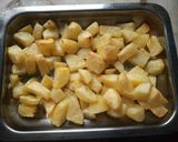 Foto del paso 6 de la receta: Papas al vinagre y doradas al horno