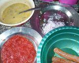 A picture of step 2 of Toasted Bread, Egg with Sardine Sauce, Baked Beans with Sausage.