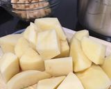Foto del paso 5 de la receta Marmitako con atún y gambas en olla cocotte