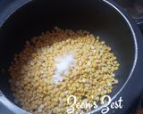 A picture of step 1 of Zambre Thool Teh Daal/Kashmiri Fried Eggs with Bengal Gram.