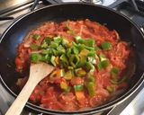 Une image de l'étape 7 de Oignons de roscoff aux tomates,poivron vert,épices et origan.