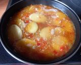 Foto del paso 3 de la receta: 244. Merluza con patatas al moscatel