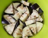 A picture of step 1 of Curd brinjal gravy.