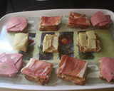 Foto del paso 7 de la receta: Pan con ajonesa especiada, queso y embutido