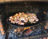A picture of step 2 of Paella with Vegetables and Meat.