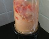 A picture of step 2 of Papaya-banana -orange smoothie.
