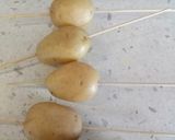 A picture of step 2 of Potato spirals.