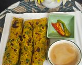A picture of step 2 of Masala thepla with tea and raita marcha.