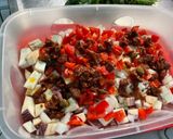 Une image de l'étape 9 de Aubergine et poivron aux tomates confites, coriandre et épices.