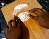 A picture of step 9 of Italian panner ravioli with pink sauce.