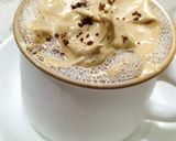 A picture of step 7 of Hand beaten frothy coffee.