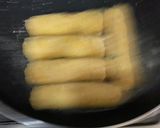 A picture of step 8 of Cheetos Cigars.