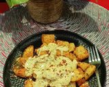 A picture of step 9 of Cheesey Spicy Garlic Potato.