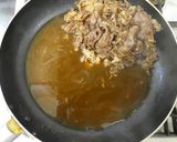 A picture of step 6 of Beef and Tofu Sukiyaki-Style with Napa Cabbage and Scallions.