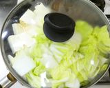 A picture of step 10 of Beef and Tofu Sukiyaki-Style with Napa Cabbage and Scallions.