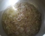 A picture of step 2 of Peas pulao.