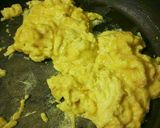 A picture of step 7 of Mushroom & Bell Pepper Breakfast Burritos.
